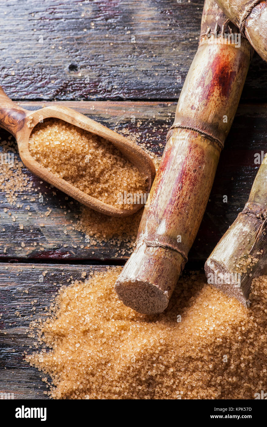 Raw sugar cane sticks and other sweets on sale in the town of Banos de Agua  Santa in Ecuador Stock Photo - Alamy