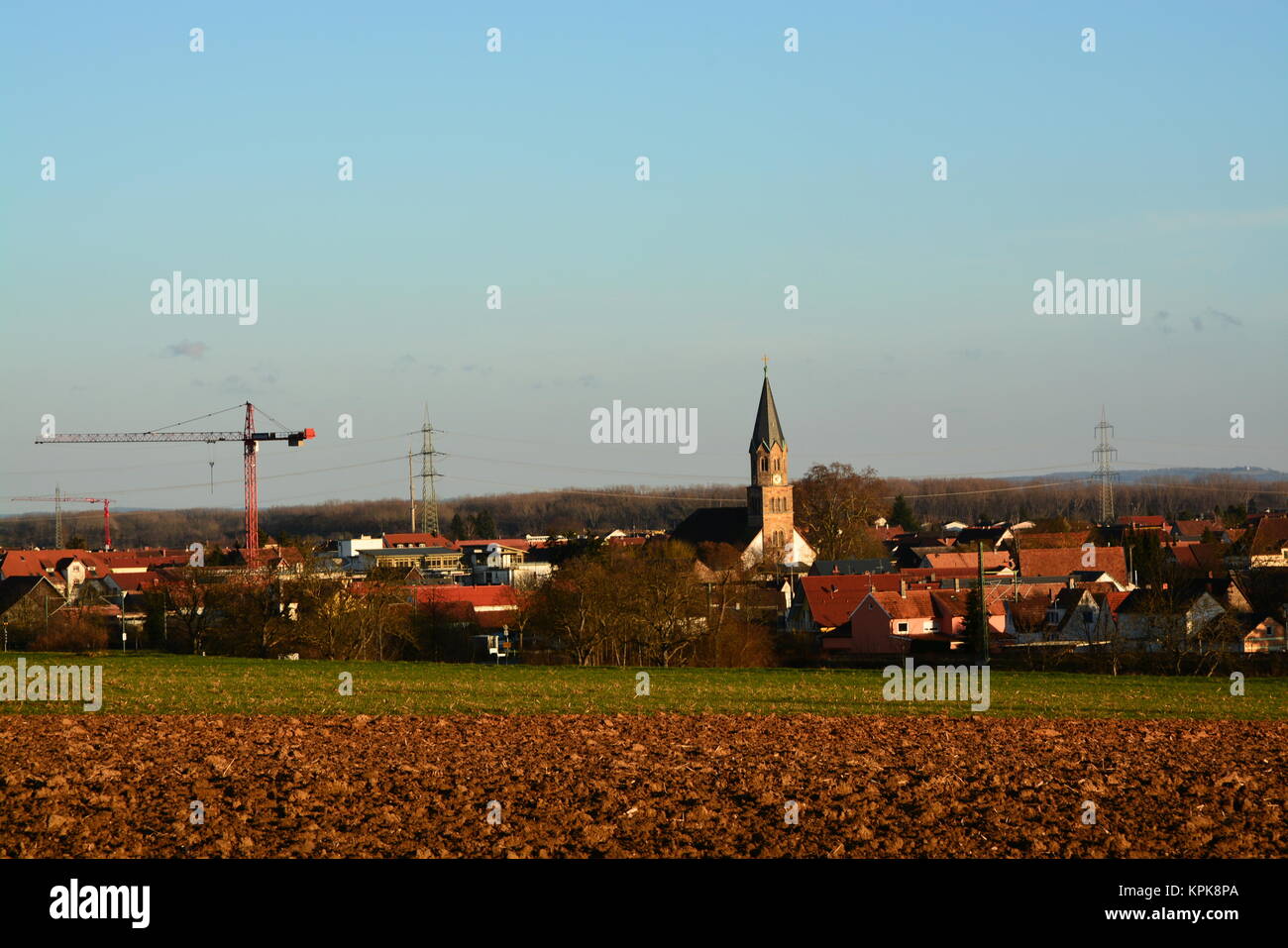 view of the steeple of st. mauritius in rÃ¼lzheim in the palatinate Stock Photo