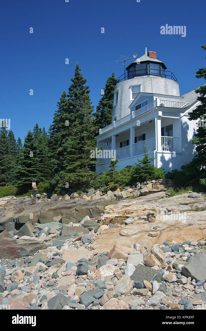 USA, Maine, Schoodic Peninsula. A home above the rocks overlooking the