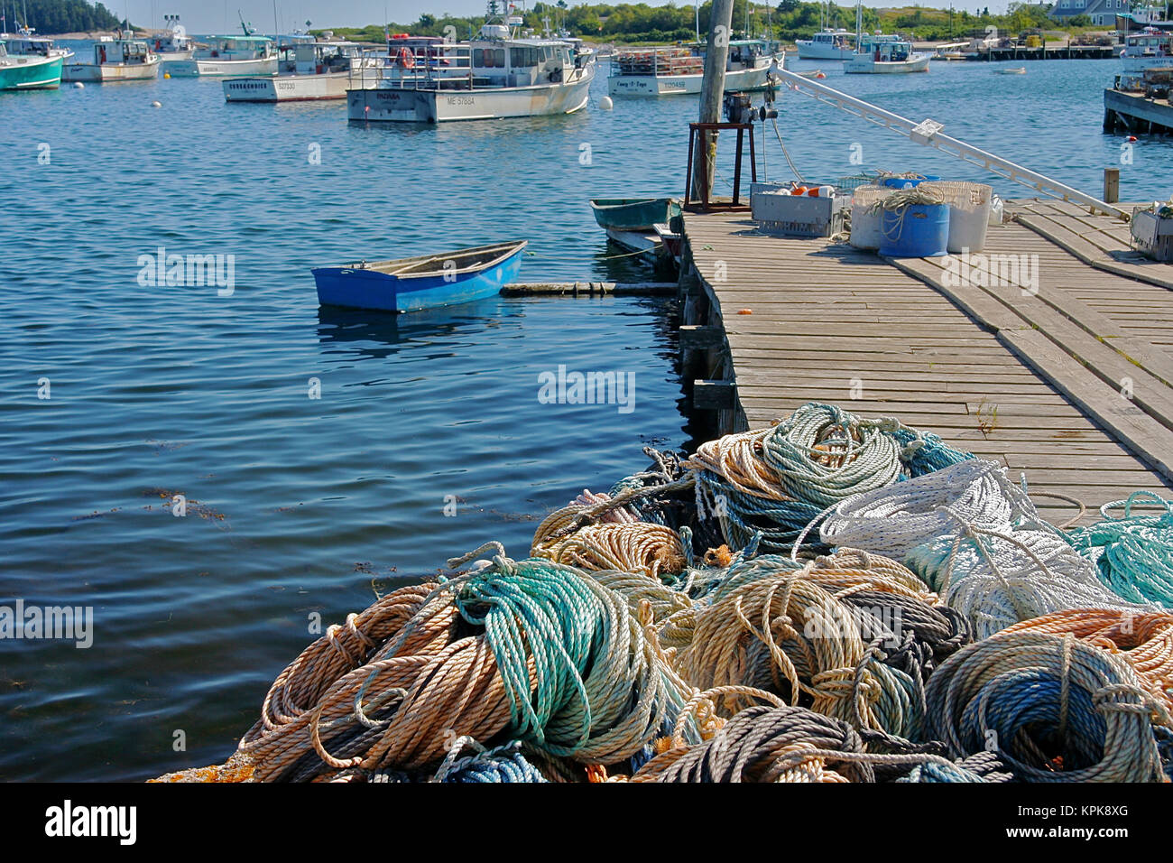 USA, Maine, Gouldsboro. Rope piled on a pier in a fishing village Stock