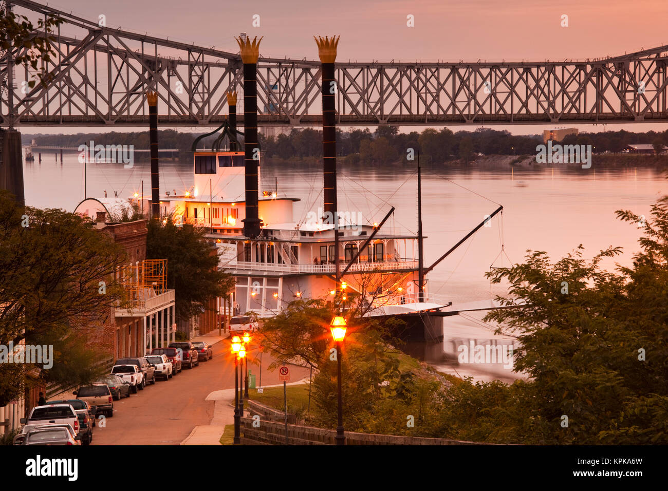 USA, Mississippi, Natchez. Natchez Under the Hill, former red-light area, with Isle of Capri Casino riverboat, dusk. Stock Photo