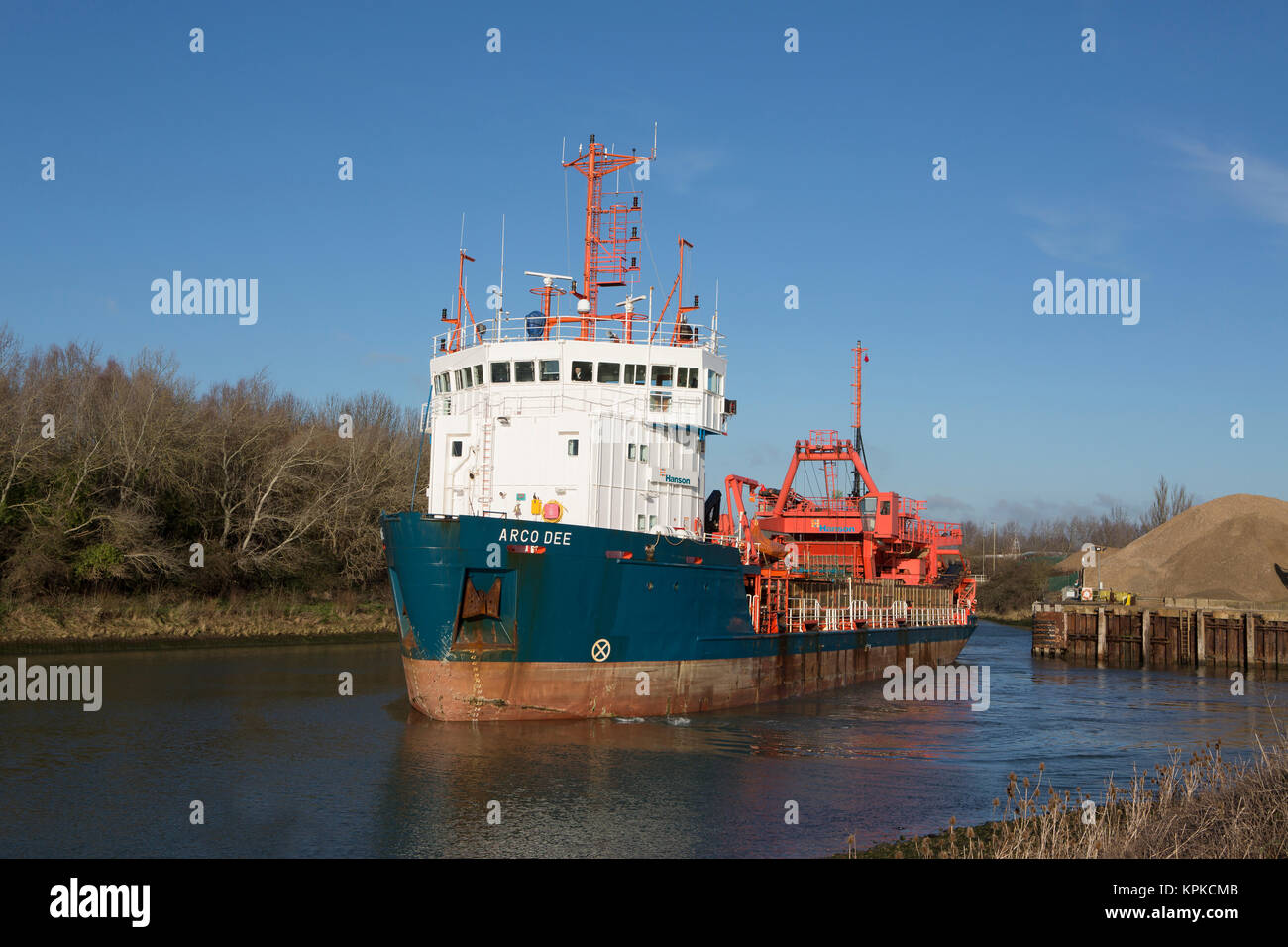 Arco Dee dredger in the upper reaches of Langstone harbour in Hampshire. Operated by Hansons Europe's largest producer of dredged sand and gravel. Stock Photo