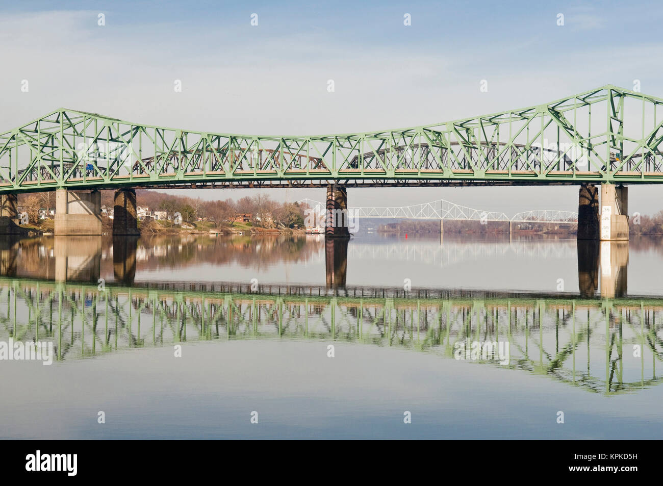 USA, WV, Parkersburg. ParkersburgBelpre cantilevered bridge reflected in Ohio River Stock Photo