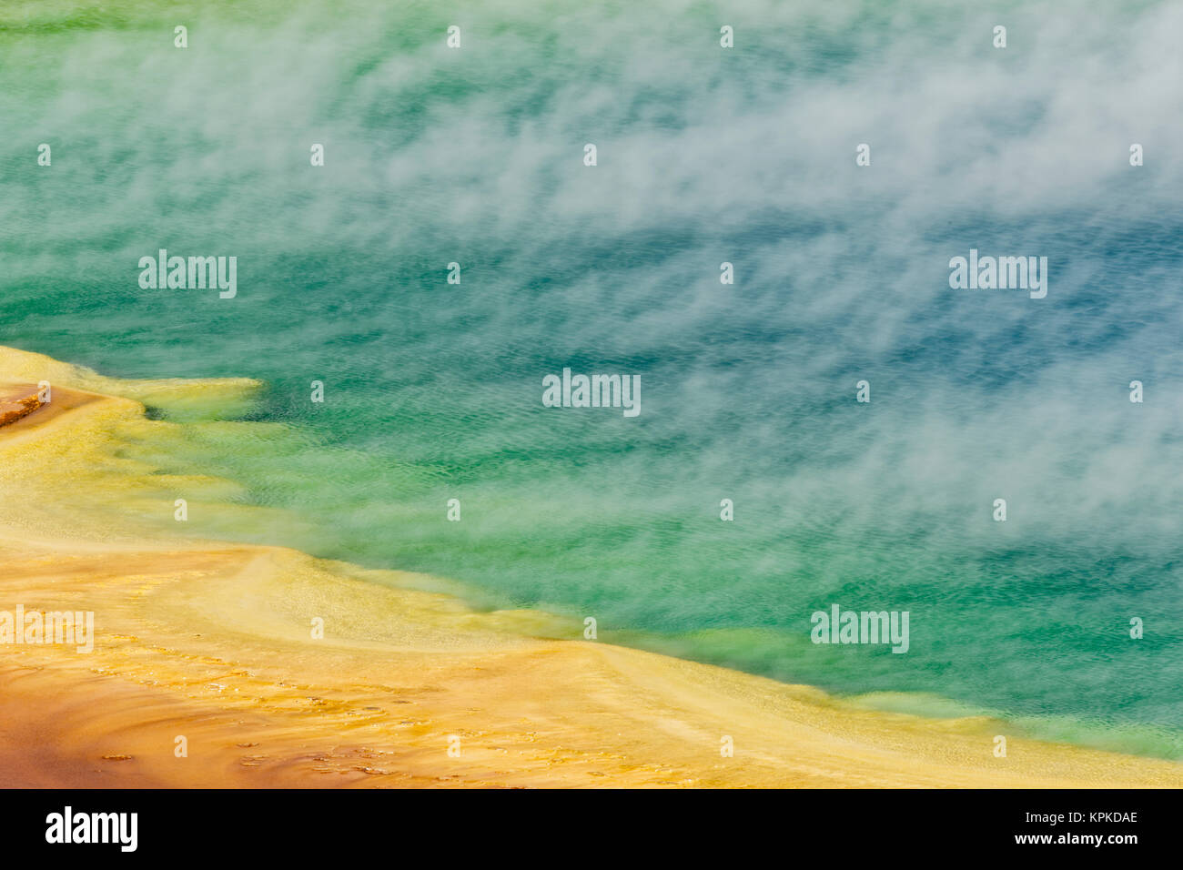 Elevated view of Grand Prismatic Spring and patterns in bacterial mat, Midway Geyser Basin, Yellowstone National Park, Wyoming. Stock Photo