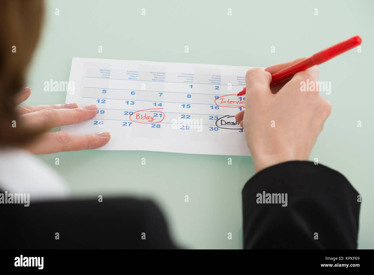businesswoman-hand-setting-important-date-on-calendar-stock-photo-alamy