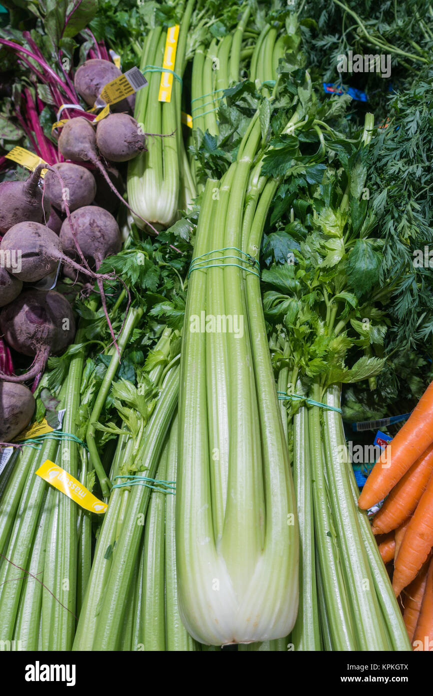 Bunches of fresh celery, carrots and beetroot in a Spanish supermarket Stock Photo Alamy