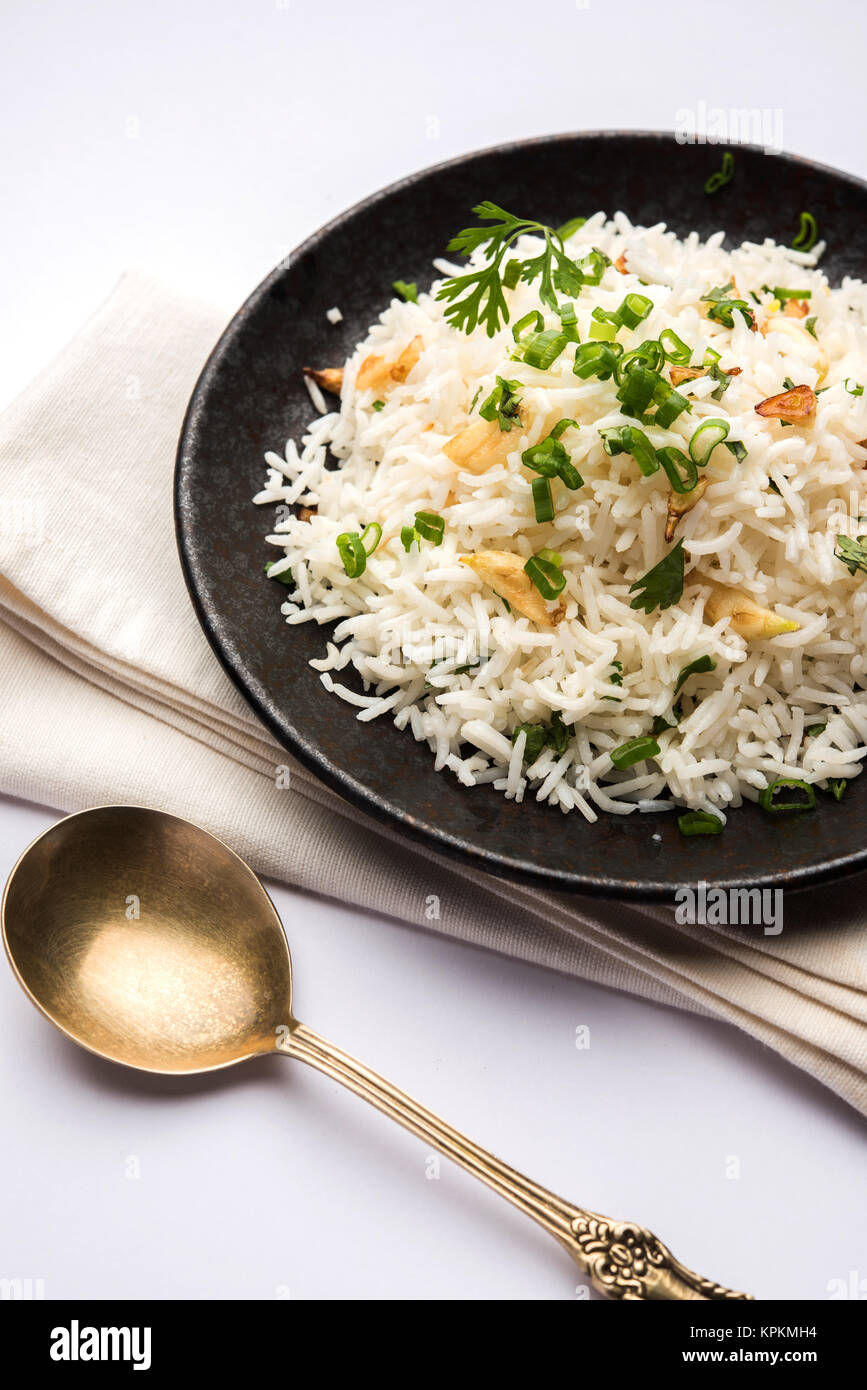 Garlic fried rice cooked white basmati rice fried with garlic and