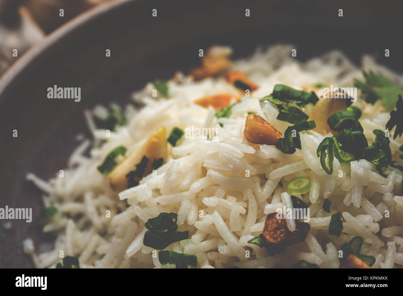 Garlic fried rice cooked white basmati rice fried with garlic and