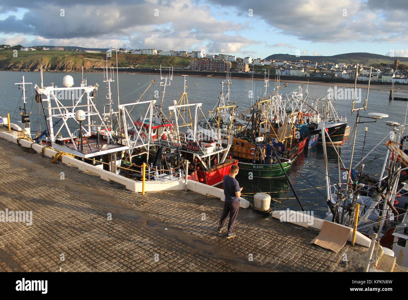 Trawler Fishing boats in Peel harbour, Isle of Man, United Kingdom. Fishing for Scallops (Queenies). Strict quotas mean the boats return to harbour. Stock Photo