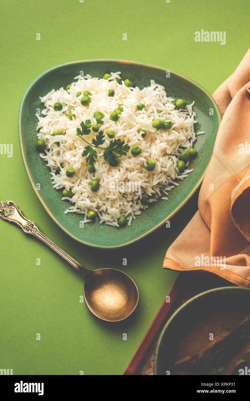 Basmati Rice Pilaf or pulav with Peas, or vegetable rice using green