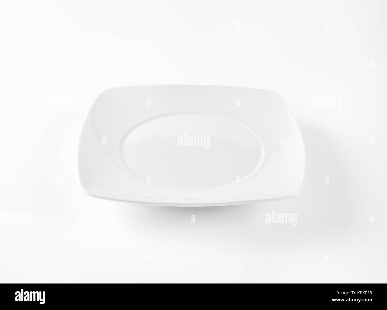 white square dinner plate Stock Photo Alamy
