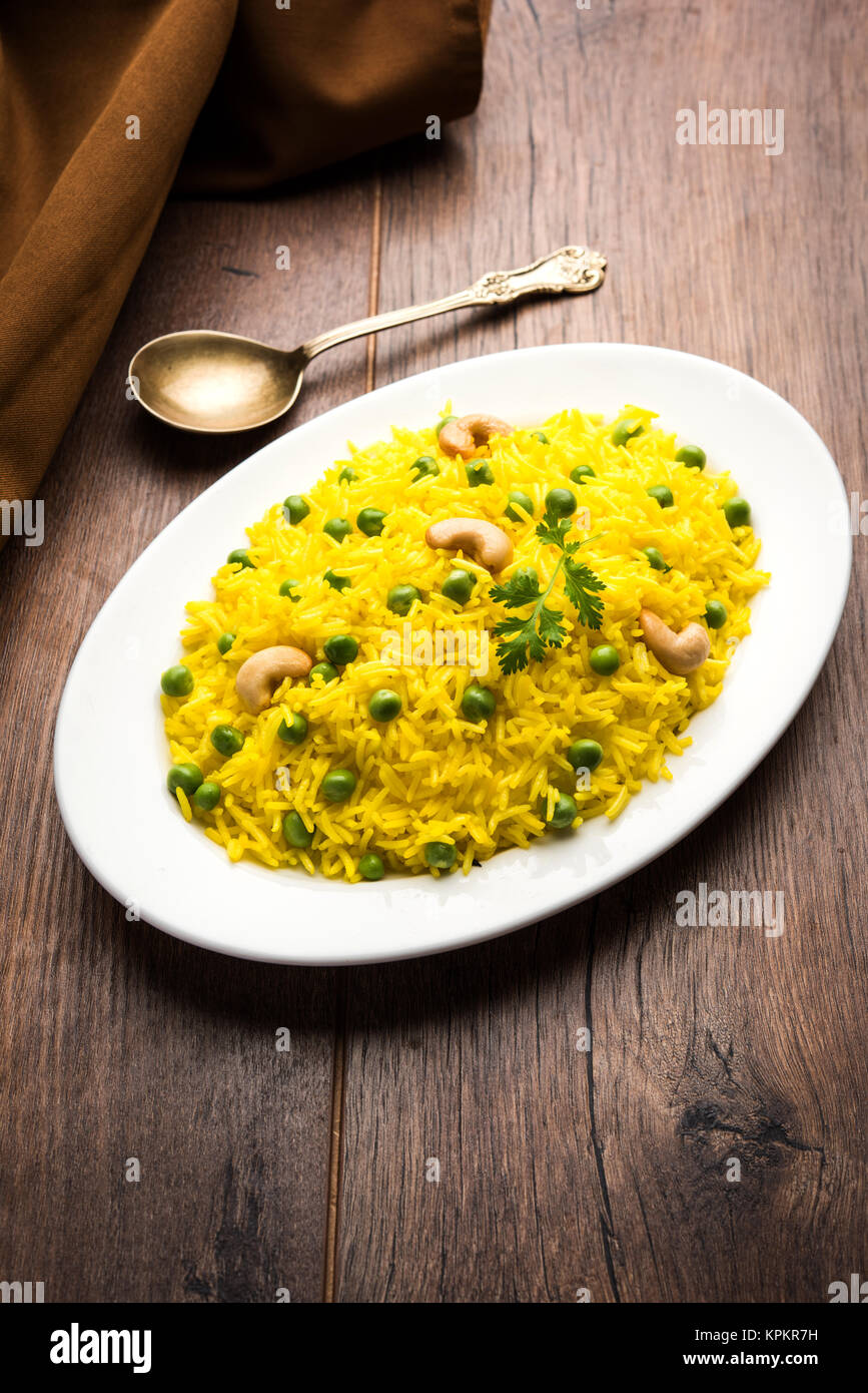 Basmati Rice Pilaf or pulav with Peas, or vegetable rice using green