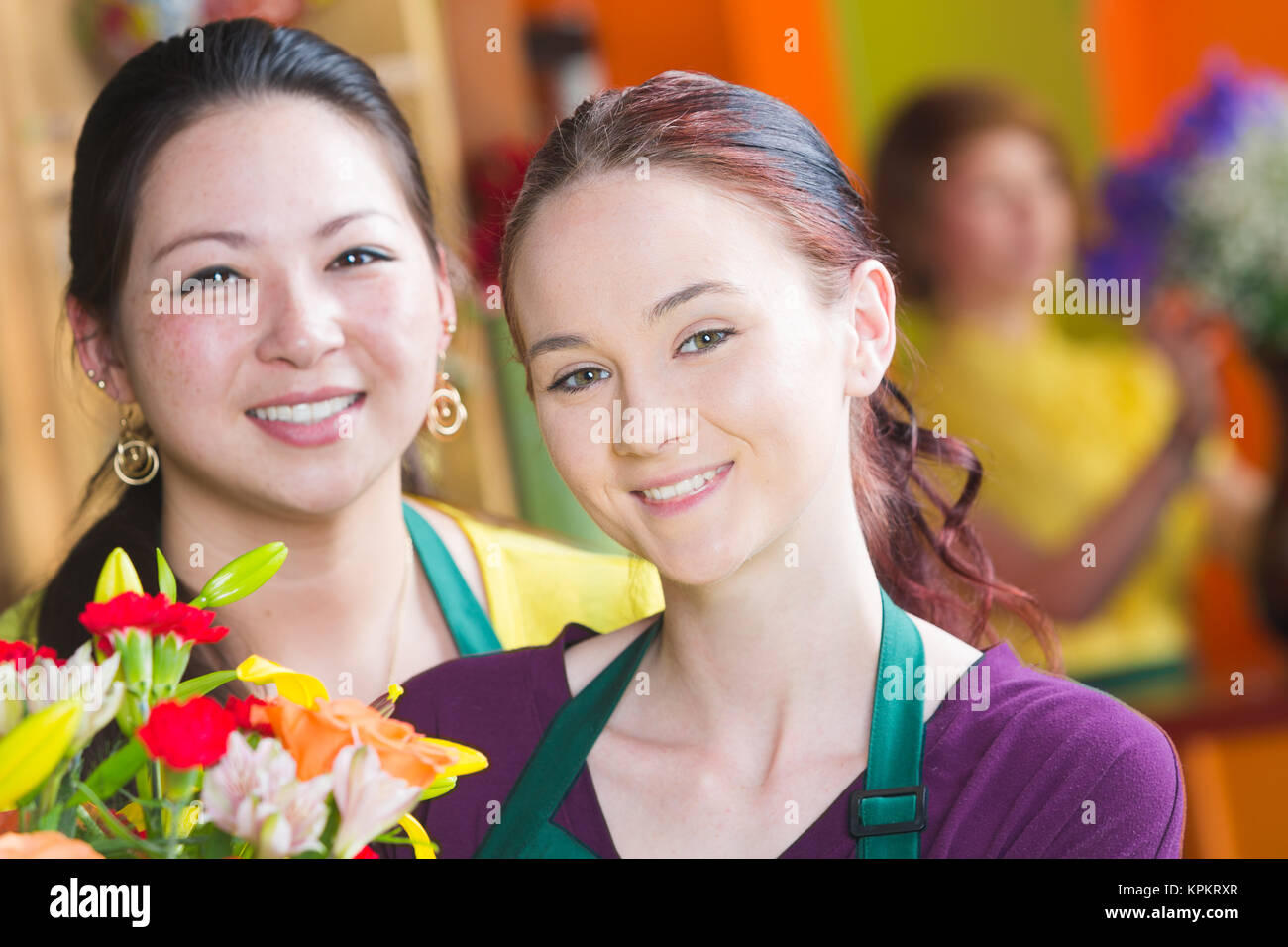 Pretty Young Flower Shop Employees Stock Photo Alamy