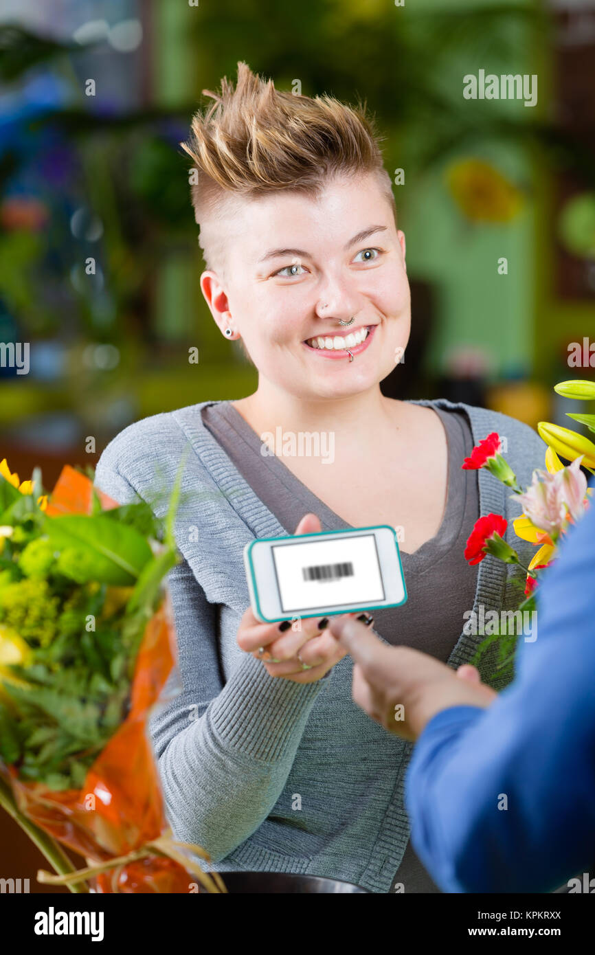 Cute Flower Shop Customer using Electronic Coupon Stock Photo Alamy