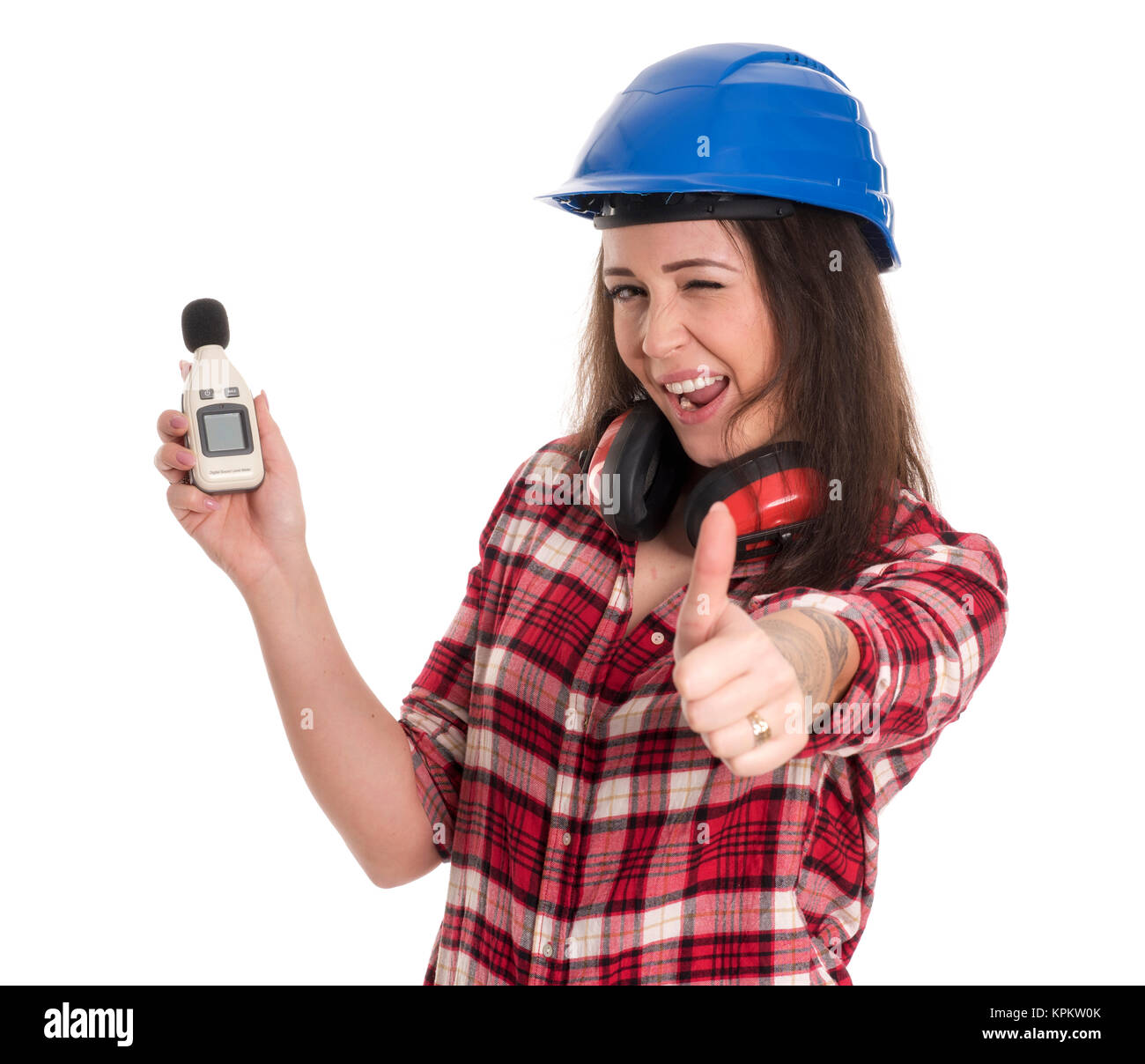 craftsmen measures the noise level and showing thumbs up Stock Photo