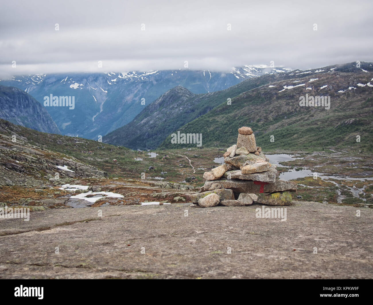 Cairn used as Trolltunga (Troll tongue) trail marker Stock Photo