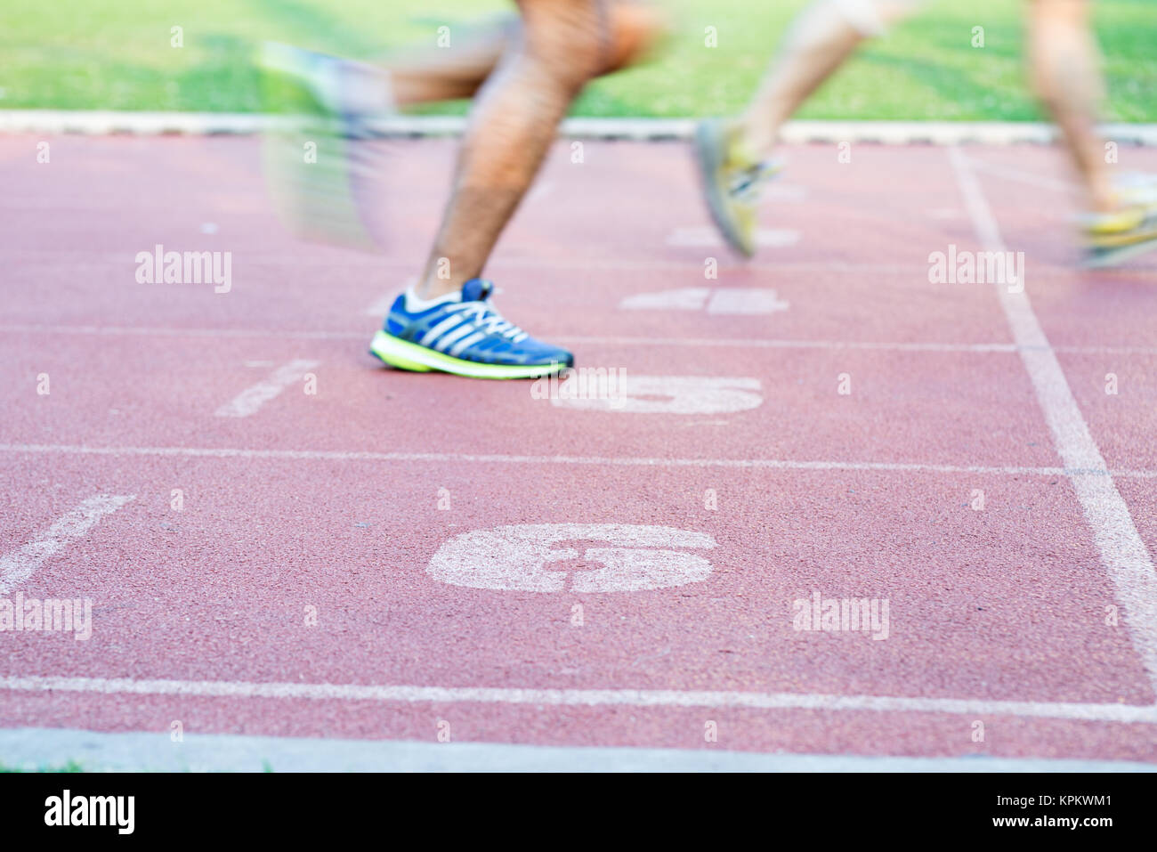 Runners feet in motion on track Stock Photo Alamy