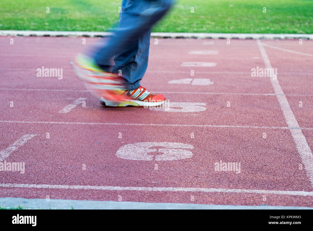Runners feet in motion on track Stock Photo Alamy
