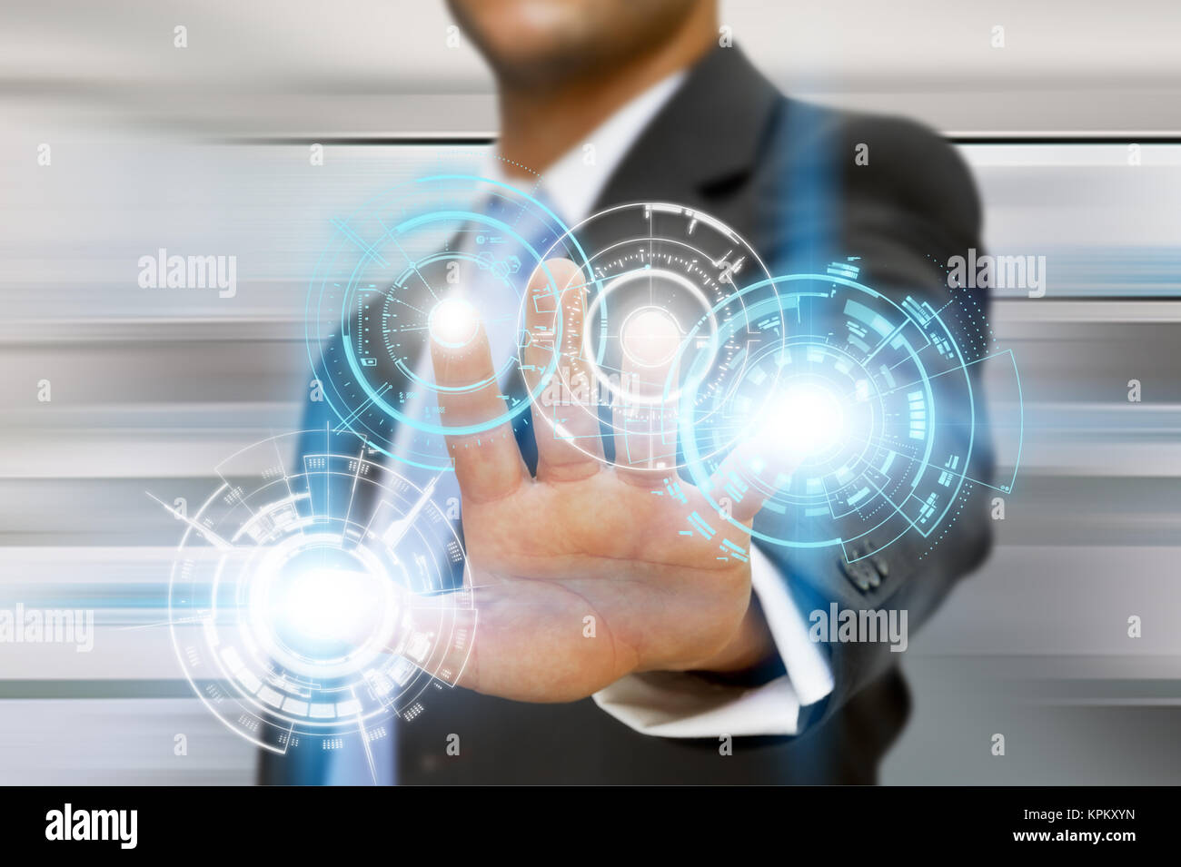 Businessman in his office using tactile interface Stock Photo - Alamy