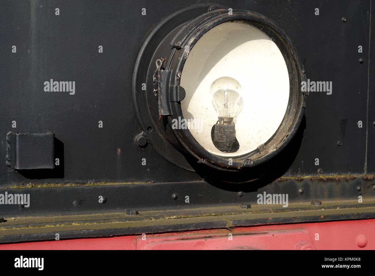 Headlights of an old locomotive in the port of Magdeburg Stock Photo