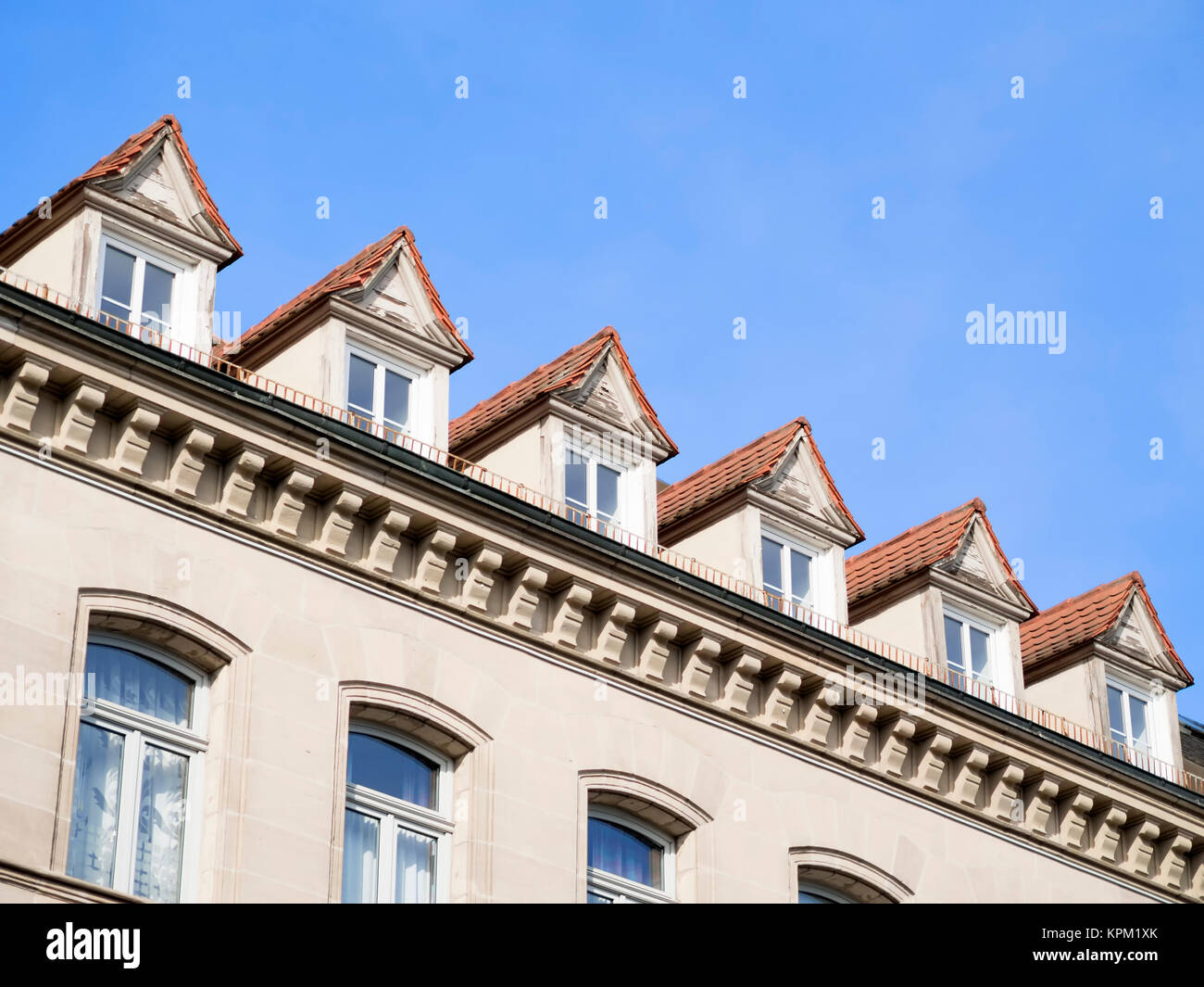 Facade of house with blue sky Stock Photo - Alamy