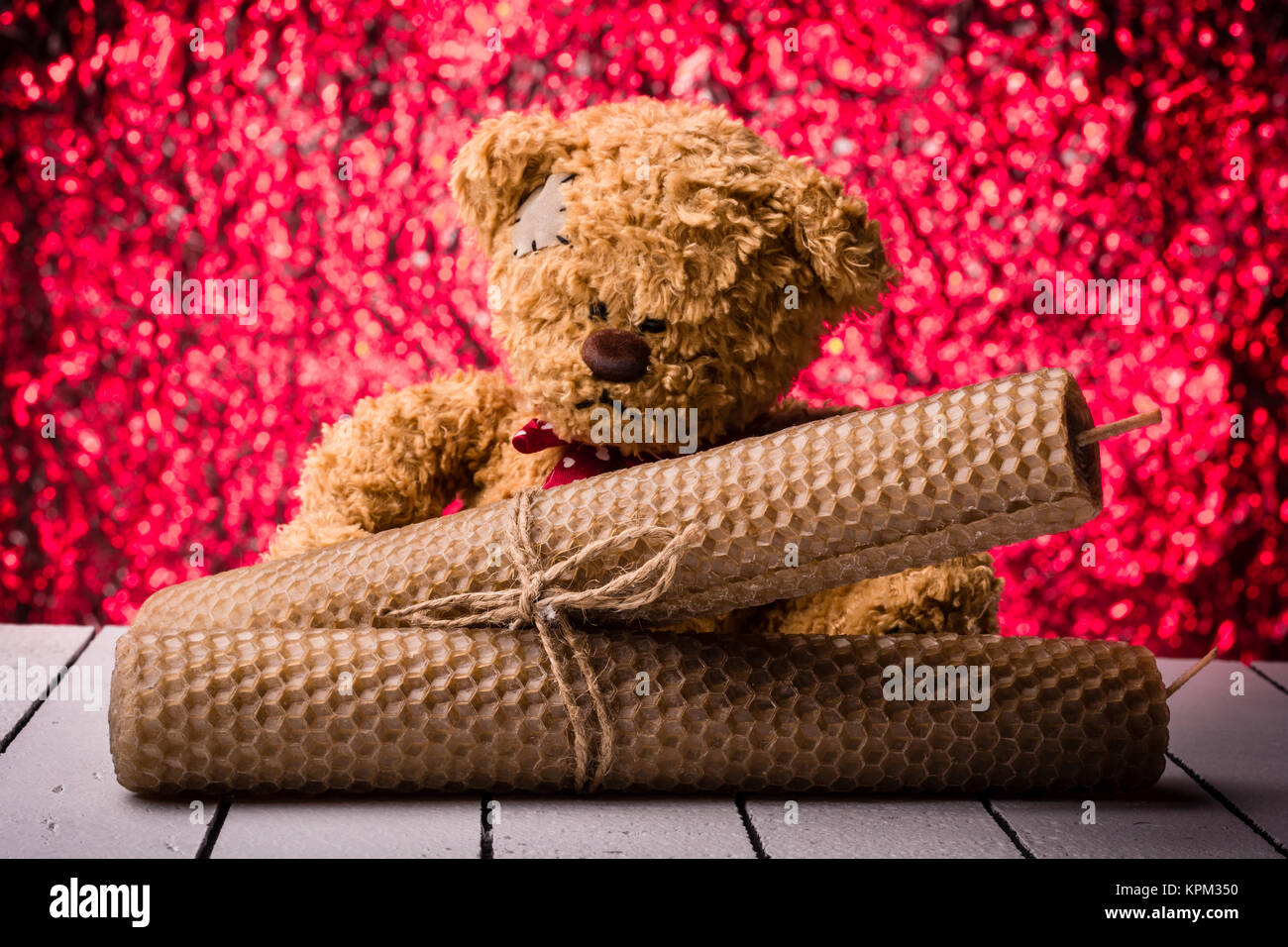 Beeswax Candles And Teddy Bear On Nice Red Background Bukeh Stock Photo Alamy