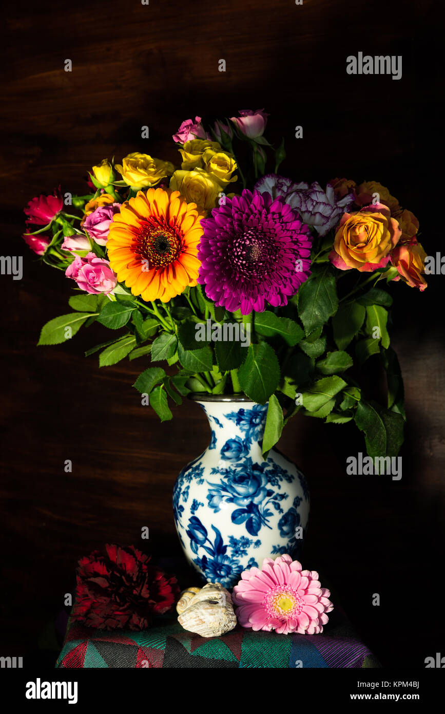 Flower still life with shell Stock Photo