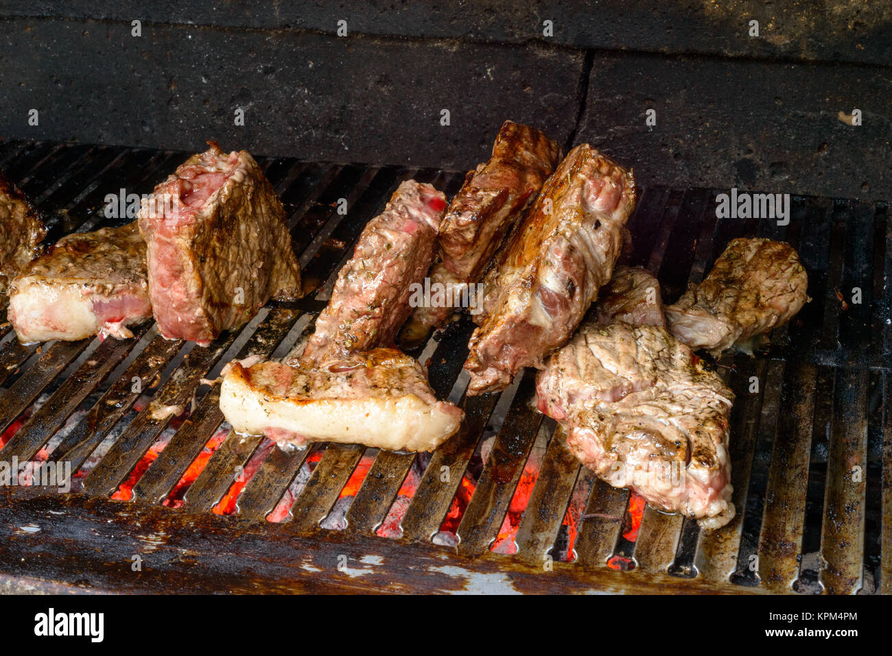 Grilling beef meat Stock Photo - Alamy