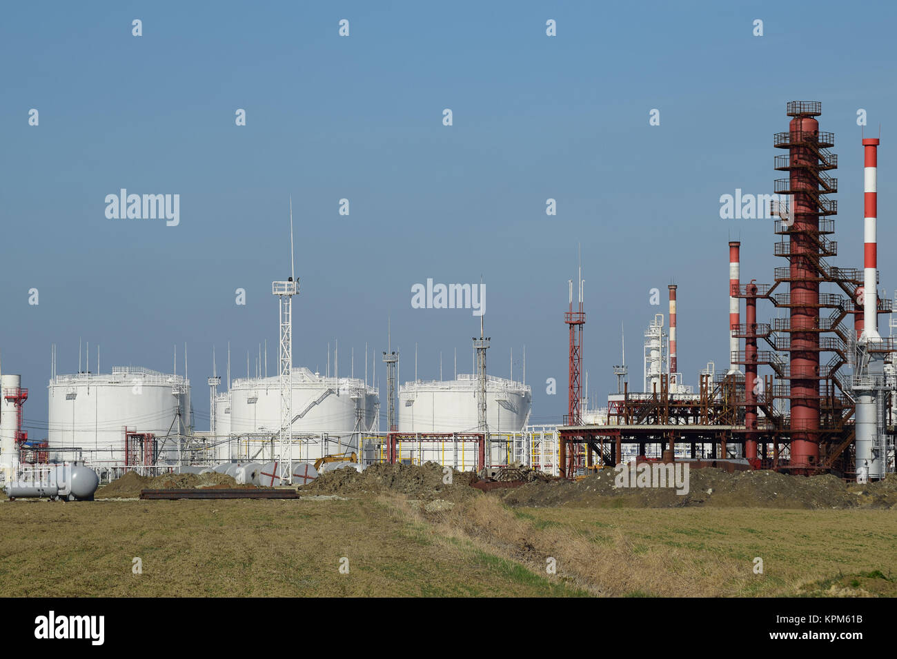 Distillation columns, pipes and other equipment furnaces refinery. Stock Photo