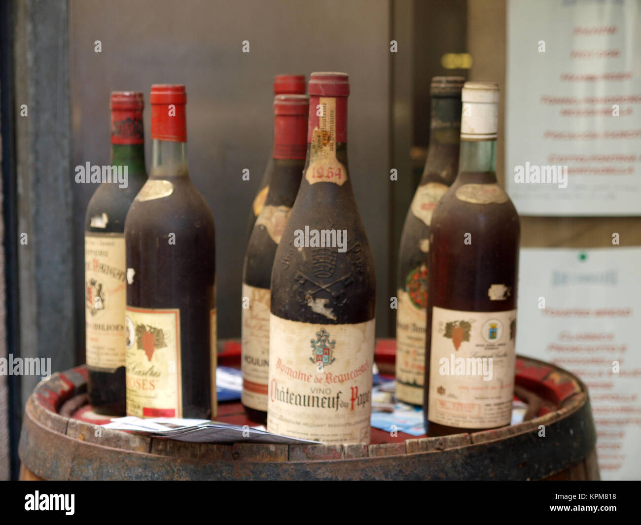 Old Bottles Of Wine On wooden Barrel Stock Photo Alamy