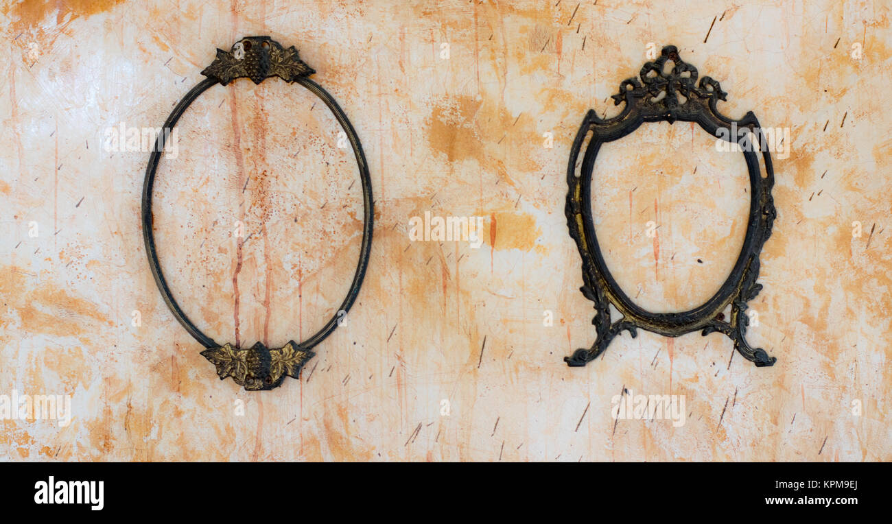Vintage Mirror frame on old concrete wall Background Stock Photo