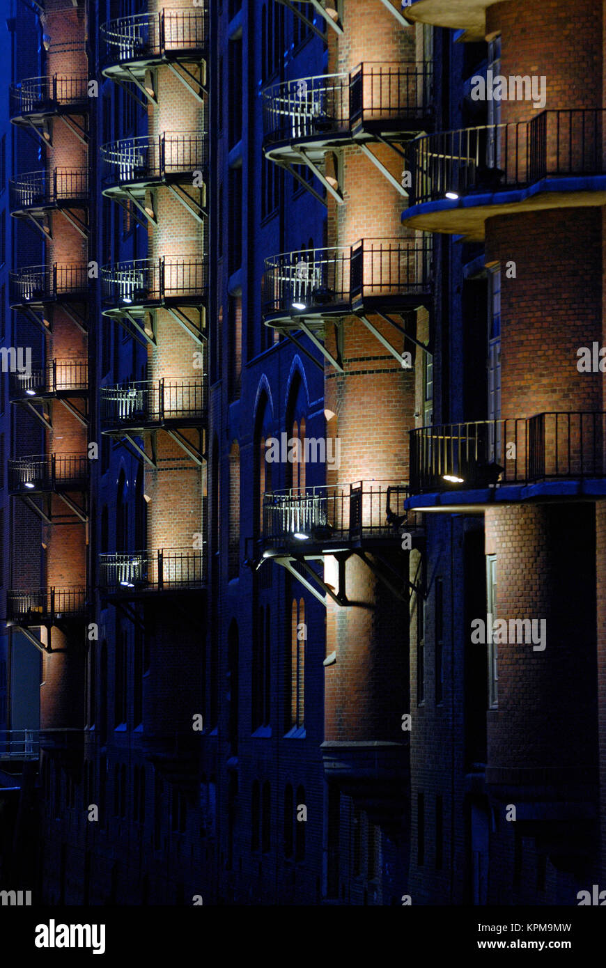 Worldwide greatest historical Warehouse complex. Speicherstadt in Hamburgs Harbour. Artificial Night-Illumination. Stock Photo