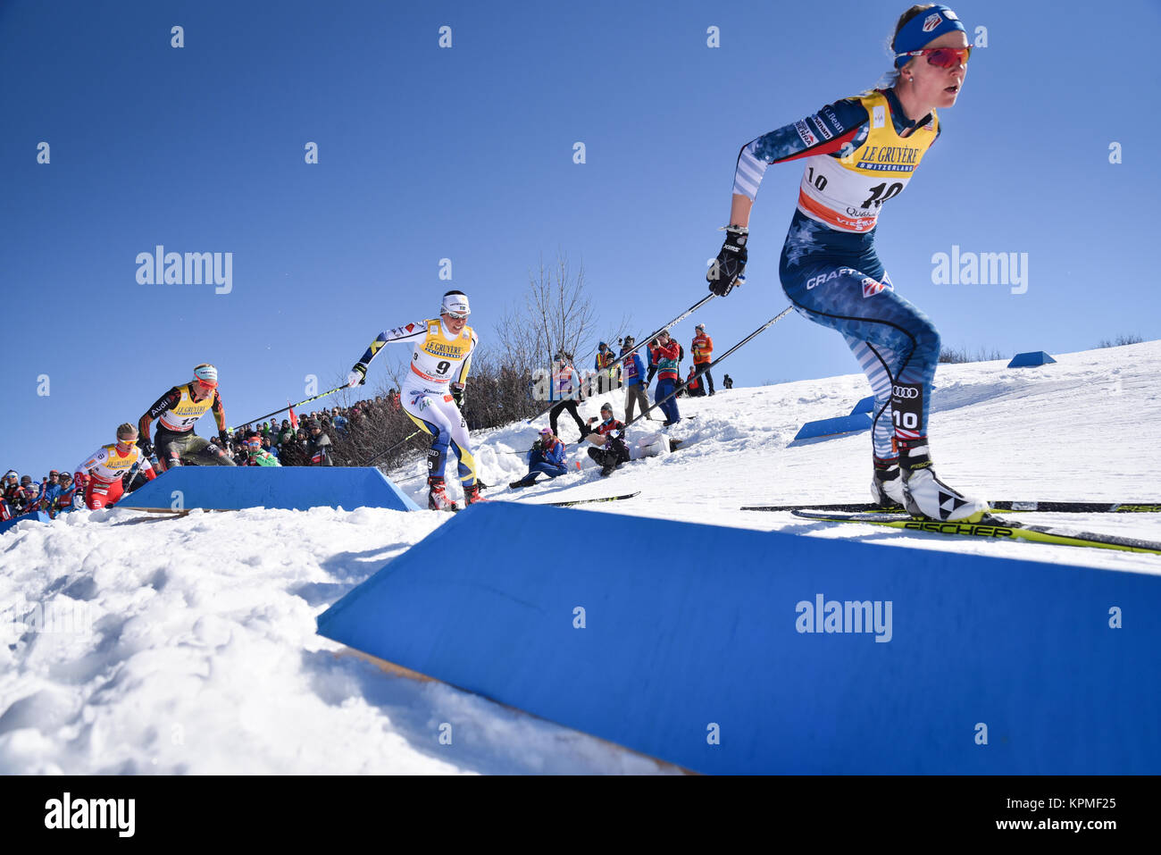 USA's Sadie Bjornsen (front) skiing in the Nordic ski WORLD CUP FINALS, Quebec, Quebec, Canada, 10K Classic; Next is Charlotte Kalla, Sweden. Stock Photo