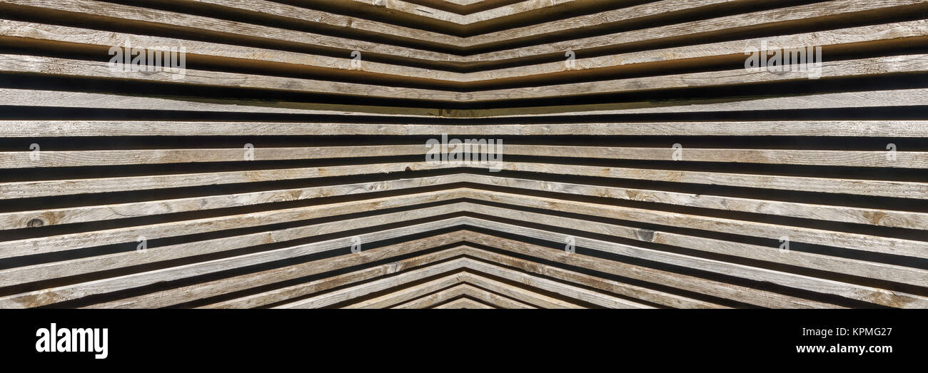 Panorama pattern of stacked,symmetrical wooden boards Stock Photo