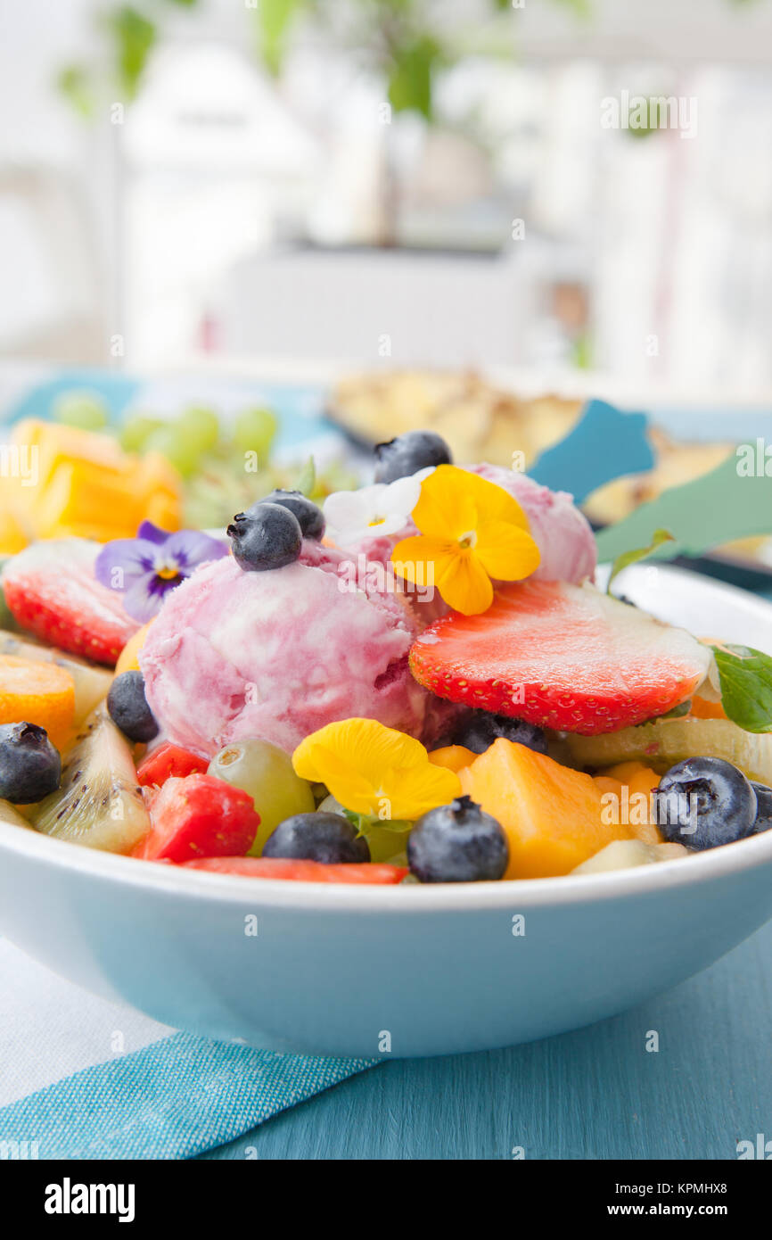 colorful fruit salad with fresh fruits Stock Photo