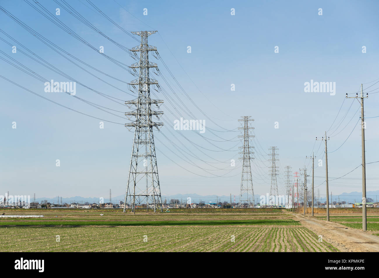Power line with blue sky Stock Photo - Alamy
