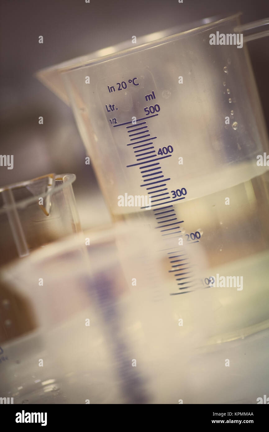 Recipients in chemistry lab Stock Photo - Alamy