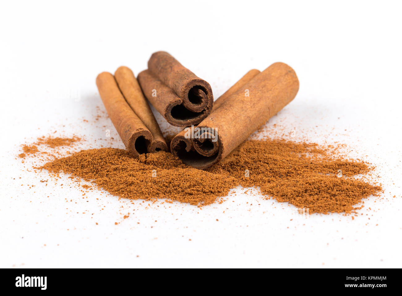 cinnamon sticks with powder Stock Photo Alamy