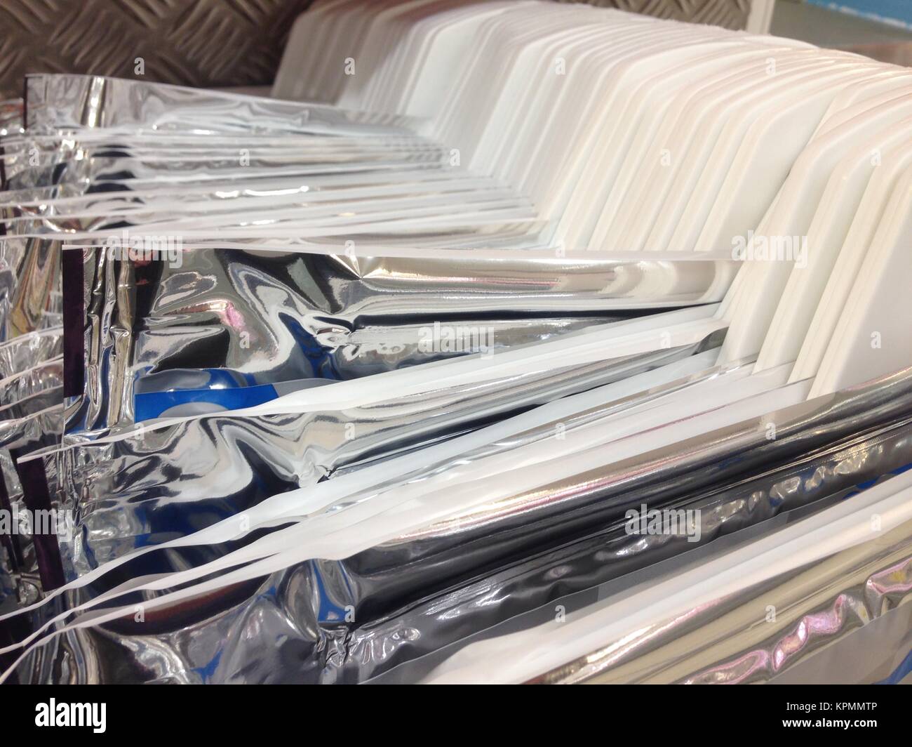 Hanging cooler bags for frozen food products Stock Photo Alamy