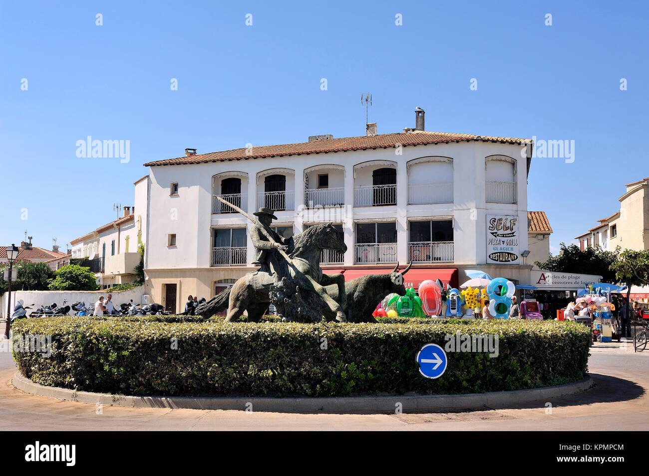 Statue of Guardian guiding a bull Stock Photo