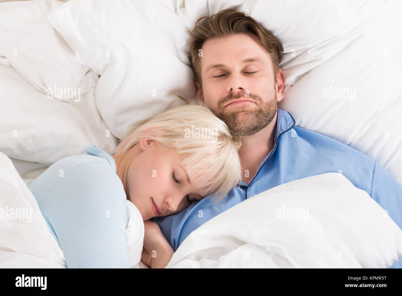 Couple Sleeping Together In Bed Stock Photo Alamy