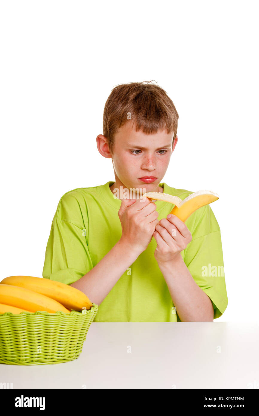 Child peeling a banana hires stock photography and images Alamy
