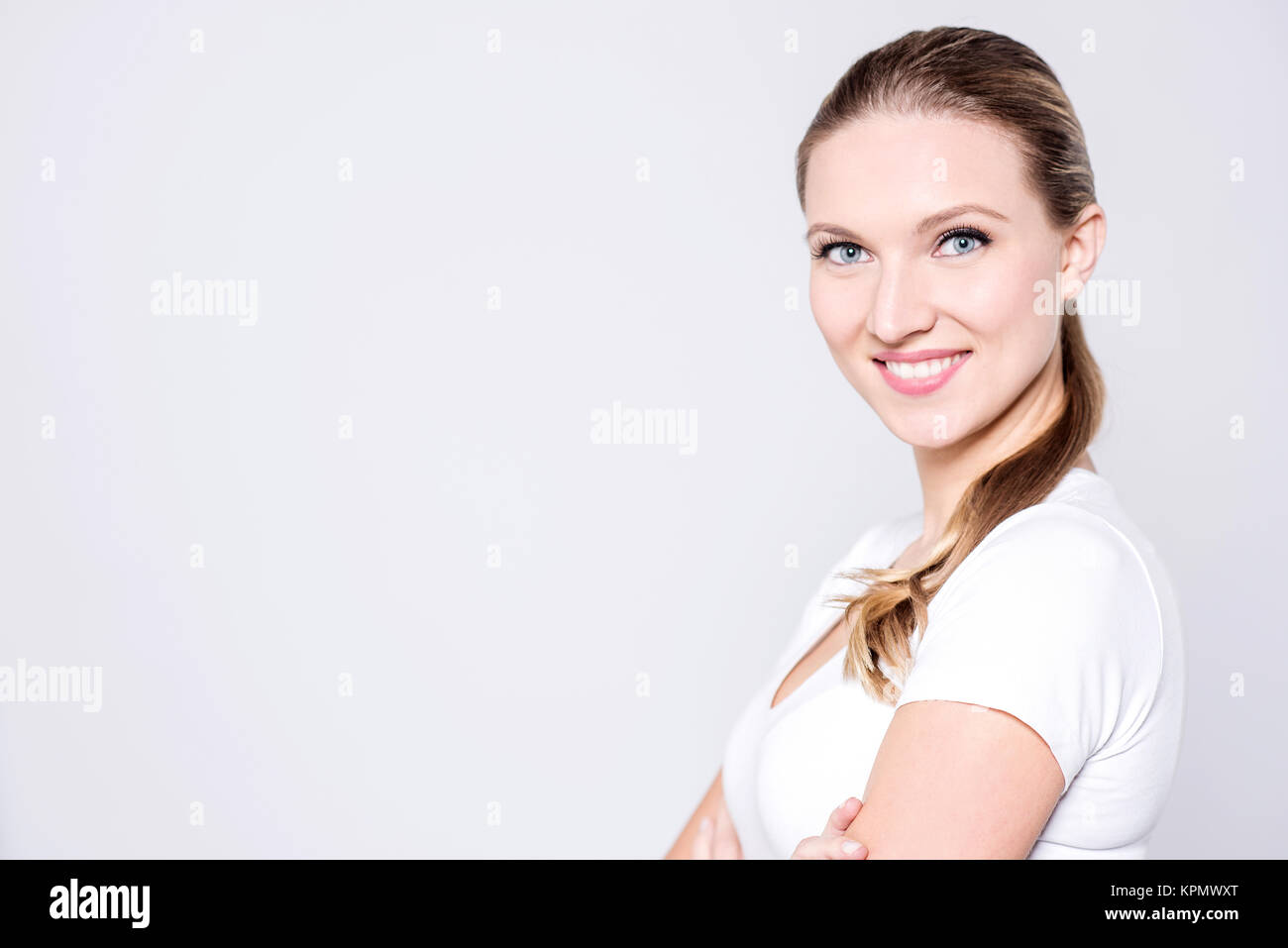 Charismatic woman wearing a bright smile Stock Photo Alamy