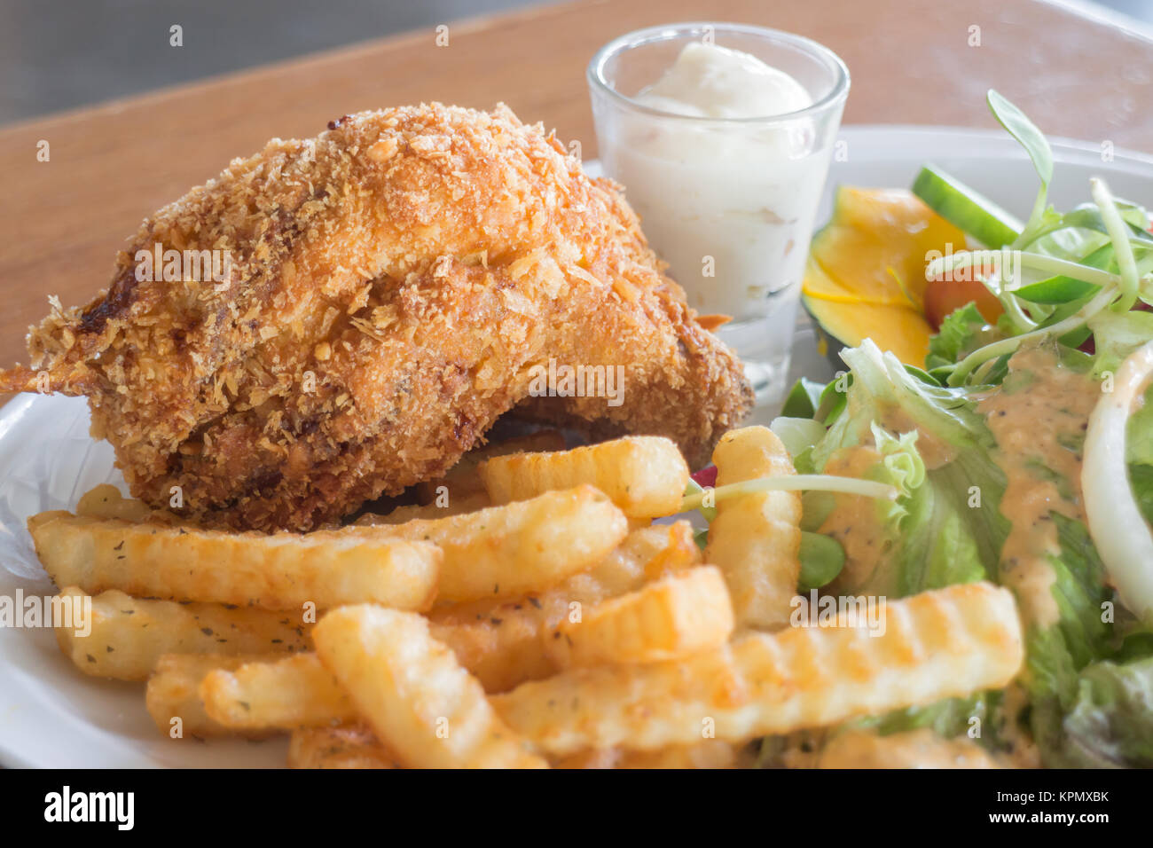 Deep fried chicken meat with organic salad Stock Photo Alamy