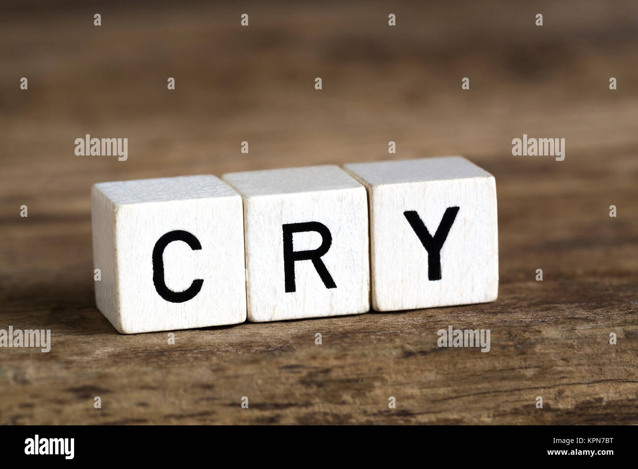 The word cry written in cubes Stock Photo