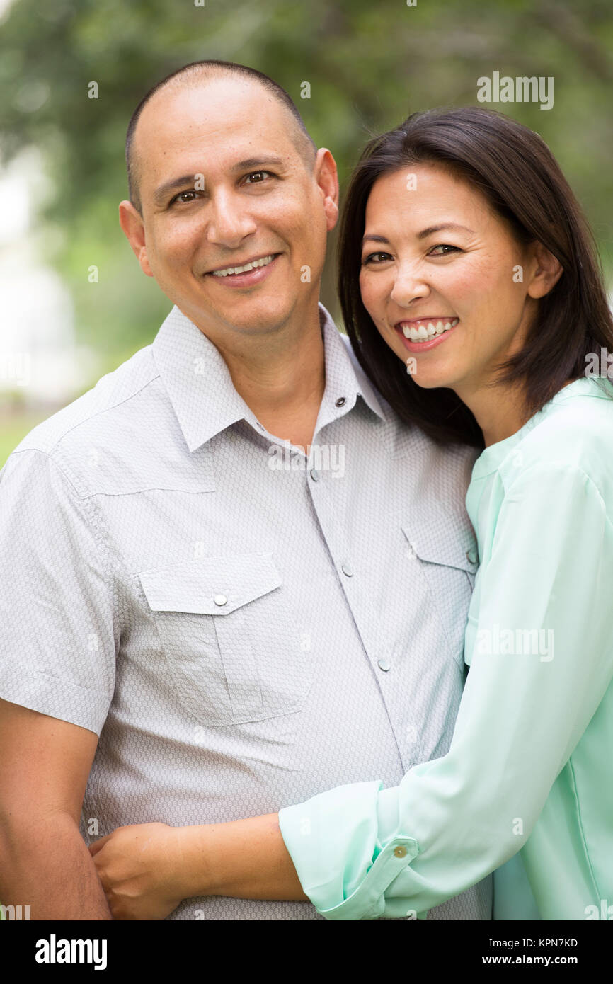Happy couple smiling and hugging. Stock Photo