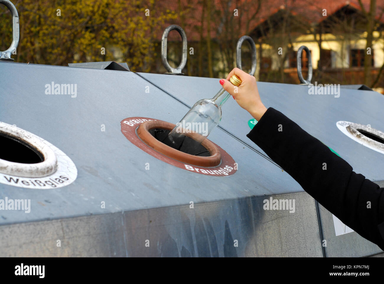 glass recycling clear glass in amber glass Stock Photo Alamy
