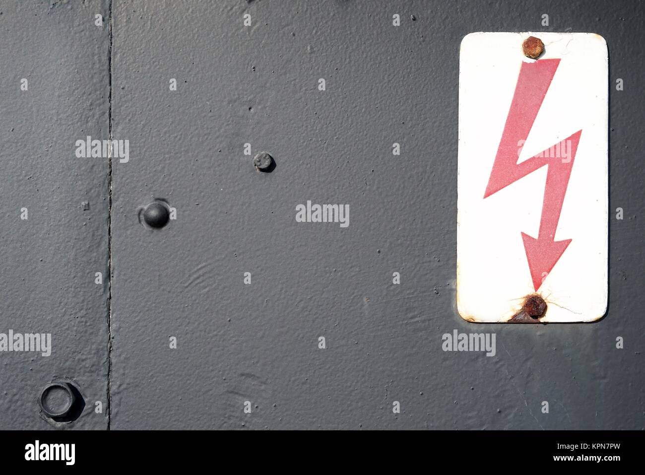 warning sign on an old locomotive in the port of magdeburg Stock Photo