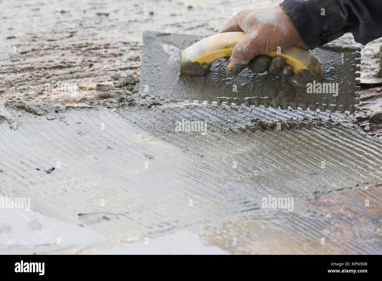Mason repairing the tiles Stock Photo Alamy