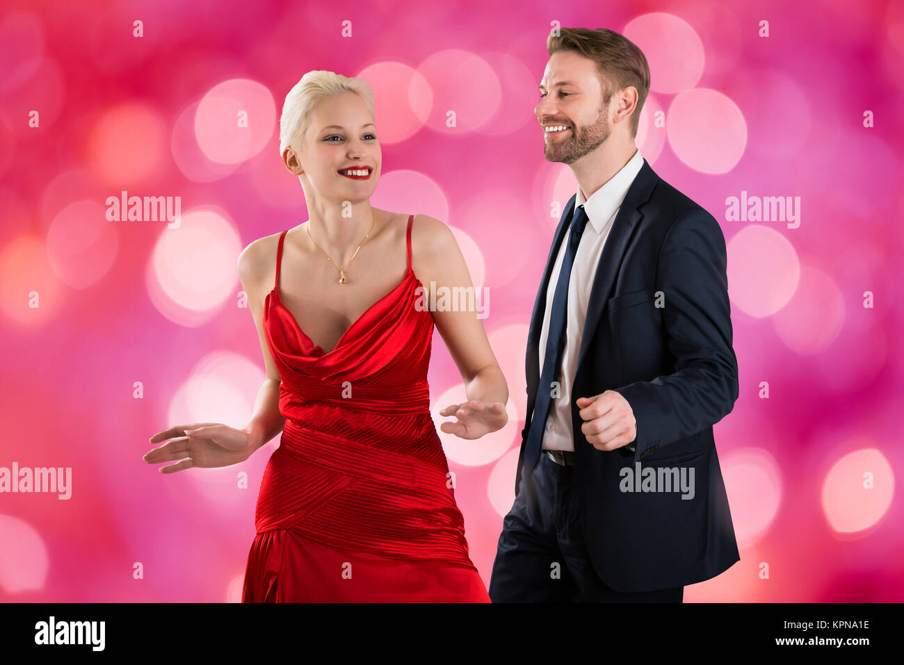 Young Couple On Bokeh Background Stock Photo - Alamy